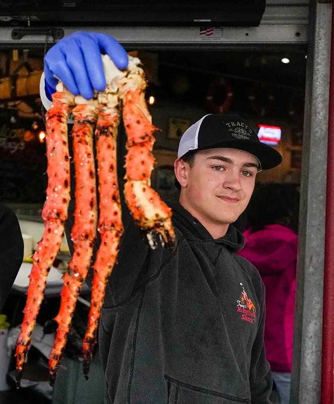 A close-up of fresh-cracked king crab legs
